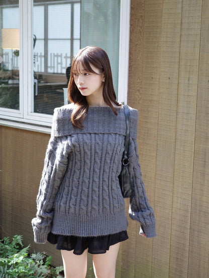 オフショルダーケーブルニット