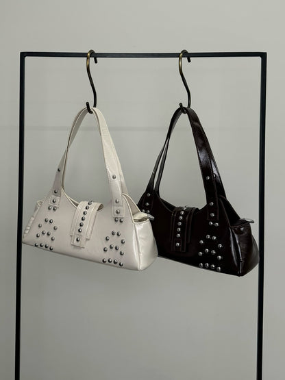 皮革触感铆钉手提包