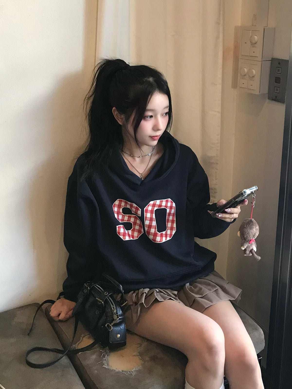 チェックロゴプリントパーカー